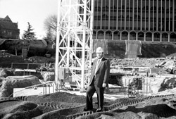 This 1987 photo shows Paul Allen standing on the construction site of the Kenneth S. Allen Library, named after his father, an associate director of the libraries for 22 years. Photo by Mary Levin.