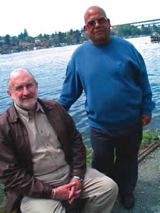 UW Fisheries and Public Affairs Professor Jim Karr (seated) and Marine Affairs Professor Ed Miles say the coming water shortages will dwarf past droughts. Scarcity has not been seen on this scale before, warns Miles. Photo by Kathy Sauber.