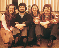 This happy student foursome from the 1970s includes Mark Emmert's roommate, Jerry Herting, '75, '86; and friends who lived in the same apartment complex. Left to right, Marjorie Hames, '76; Herting; Molly Mitchell Hemingson, '74; and Emmert. Photo courtesy Jerry Herting.