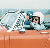 Incoming UW President Mark Emmert, '75, gets ready to race his Austin-Healey sports car in the early 1970s. Photo courtesy Mark Emmert.