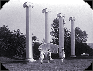 Three dancers celebrate the
restored columns in their Sylvan Theater setting in this 1930s photo.